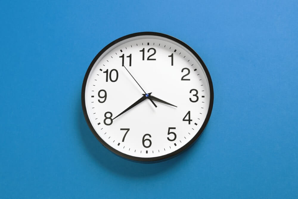 clock on the blue wall