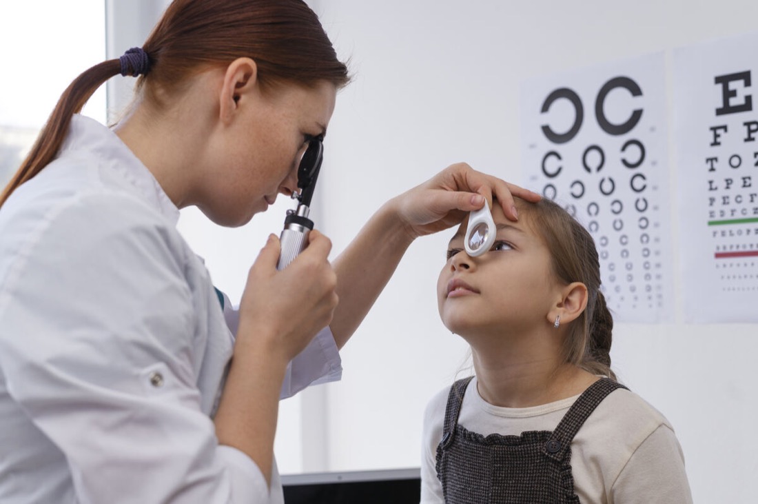 Child at a regular eye checkup with the eye doctor